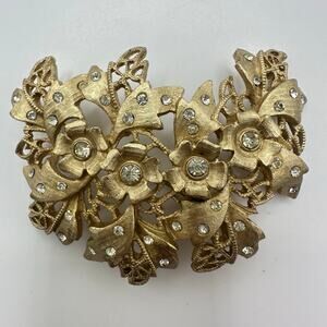 Kramer signed vintage gold tone clear glass rhinestones flowers floral brooch